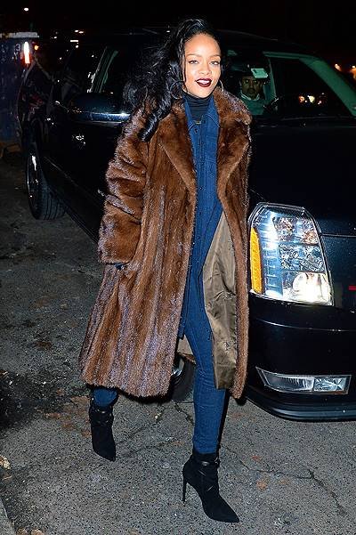 Rihanna rocks a big fur coat and all denim jumpsuit while out in NYC