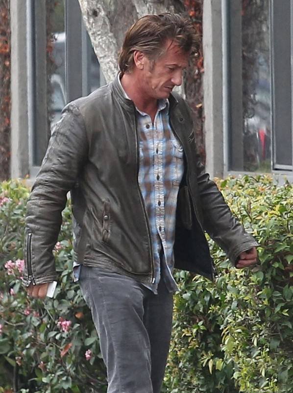 Sean Penn & Charlize Theron Arrive At A Studio