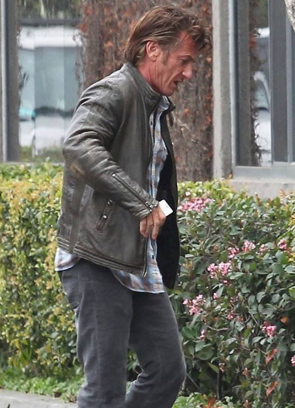 Sean Penn & Charlize Theron Arrive At A Studio