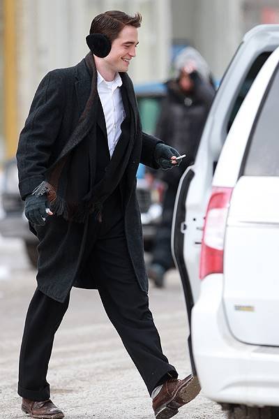 Robert Pattinson walks to his trailer after filming a scene for 'Life' in Canada