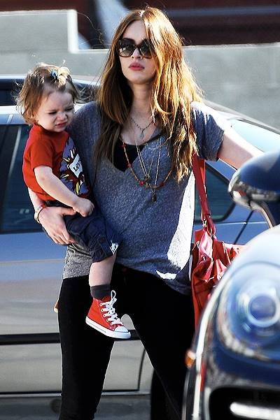 Pregnant Megan Fox carries son Noah as she leaves DMH Aesthetics medical facility in Larchmont Village. Little Noah is spotted with what looks like a blue elastic hair band in his bangs. Featuring: Megan Fox,Noah Green Where: Los Angeles, California, Uni