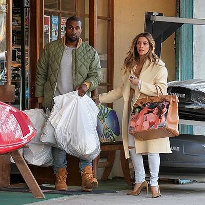 Kim Kardashian and Kanye West shop at Sport Store in Los Angeles Featuring: Kim Kardashian,Kanye West Where: Los Angeles, California, United States When: 26 Dec 2013 Credit: WENN.com