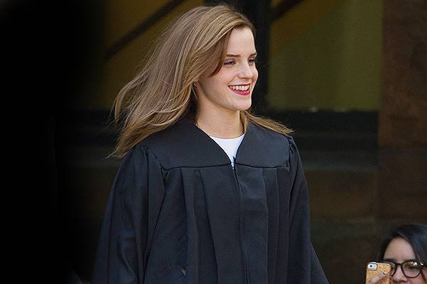 Actress Emma Watson gets an armed police escort as she recieves her degree in English Literature from Brown University in Providence, Rhode Island