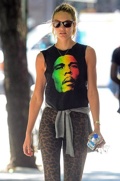 EXCLUSIVE: Candice Swanepoel wears Bob Marley shirt and leopard tights in Soho, NYC