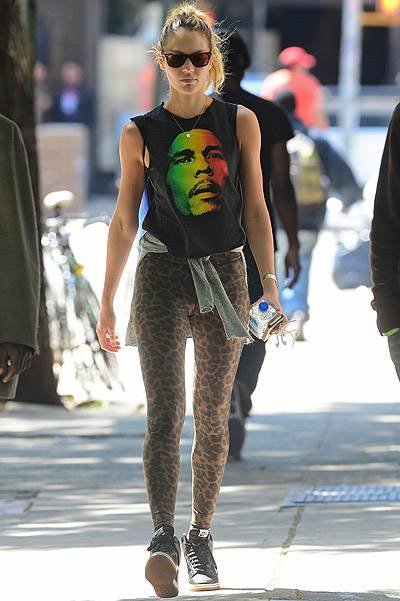 EXCLUSIVE: Candice Swanepoel wears Bob Marley shirt and leopard tights in Soho, NYC