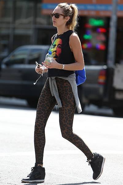 EXCLUSIVE: Victoria Secret model Candice Swanepoel walks around SoHo with a Bob Marley t-shirt and leopard tights in New York City