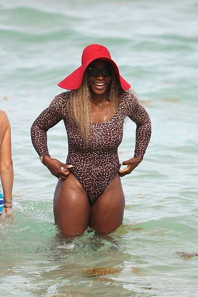 Serena Williams in a leopard print bodysuit at the beach in Miami