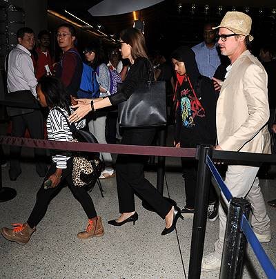Angelina Jolie and Brad Pitt with Maddox and Zahara at LAX