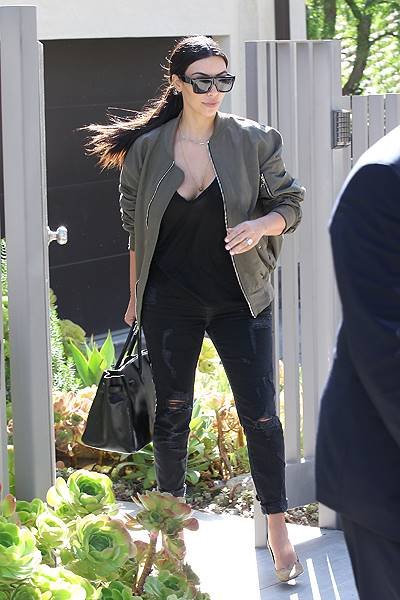 Kim Kardashian at a private residence in Beverly Hills when she found closed door the first time she came