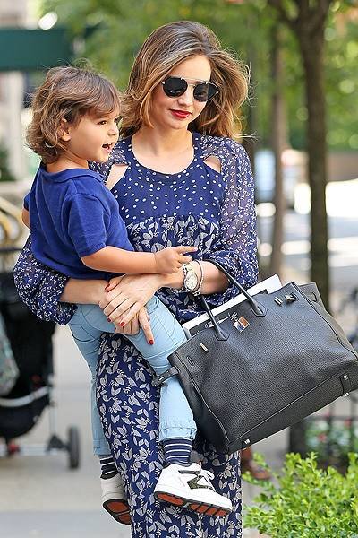 Miranda Kerr is all smiles as she steps out with her son Flynn Bloom in New York City