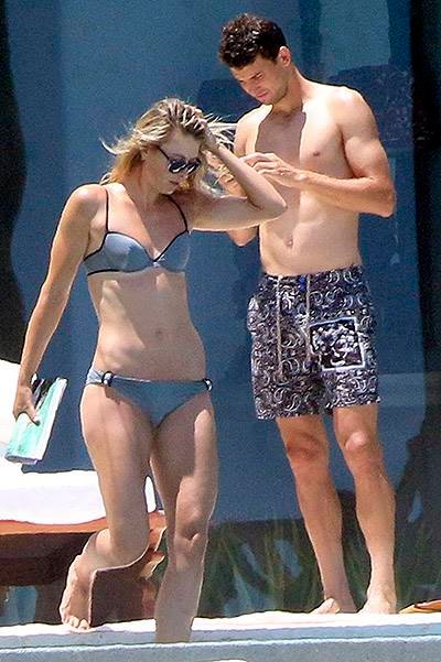 EXCLUSIVE: aria Sharapova shows off her impressive bikini body in a grey two-piece as she parties with her boyfriend Grigor Dimitrov in Los Cabos, Mexico