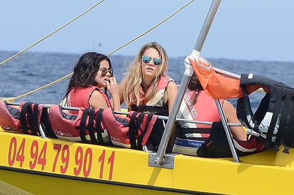 Selena Gomez and Cara Delevingne spend time parasailing, riding jet skis and relaxing on a yacht while on holiday together in Saint-Tropez Featuring: Selena Gomez,Cara Delevingne Where: Saint-Tropez, France When: 22 Jul 2014 Credit: SIPA/WENN.com **Only