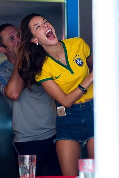 Models Alessandra Ambrosia and Adriana Lima watch the Brazil vs Germany World Cup match