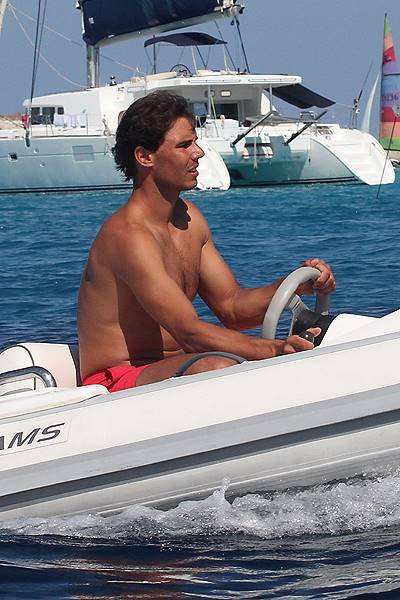 EXCLUSIVE: Rafael Nadal driving a little boat with his friends in Formentera
