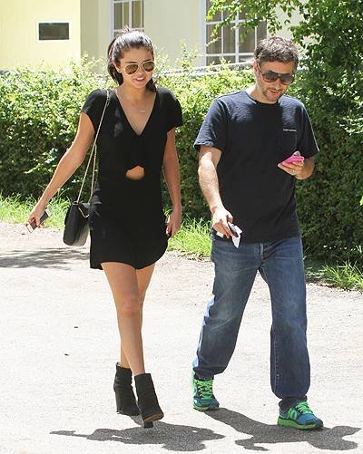 Selena Gomez and "Spring Breakers" director Harmony Korine seen taking a stroll on the beach in Miami Beach