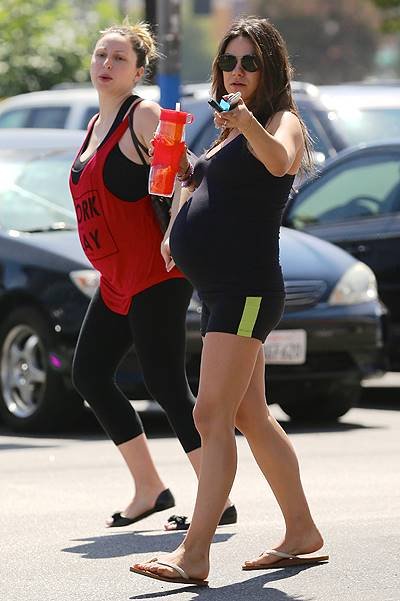 Mila Kunis Celebrates Birthday At Maternity Yoga Class, Gets Bouquet Of Flowers From Classmate