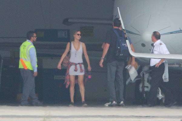 *EXCLUSIVE* Jennifer Lawrence and Chris Martin fly back to L.A. together in a private jet  **NO WEB FOR 24 HOURS, EMBARGO ENDS 10:30 AM PST ON 9/23/14**