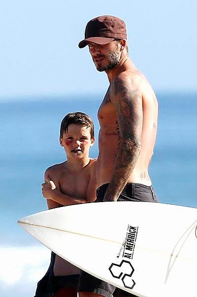 David Beckham takes his son to a surf lesson in Malibu