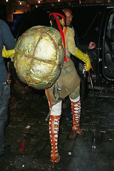 Rihanna dressed up as Raphael from Teenage Mutant Ninja Turtles out clubbing in the rain on Halloween night in NYC