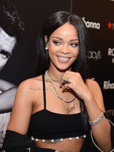 Rihanna Meets With Fans At ROGUE MAN Fragrance Launch