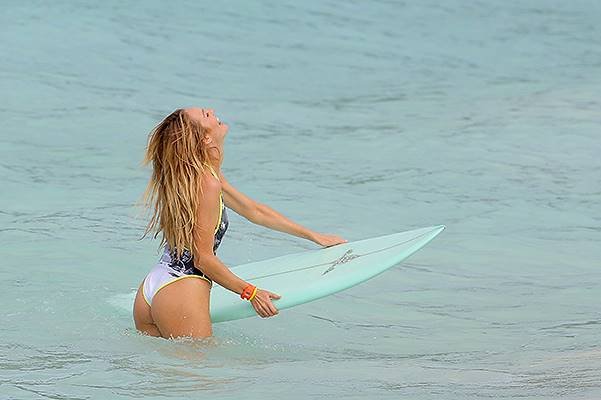 EXCLUSIVE: Candice Swanepoel is seen showing off her bikini body in the Caribbean