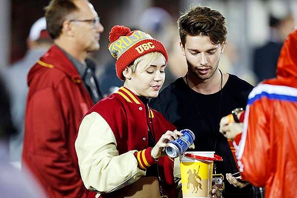 Patrick Schwarzenegger and Miley Cyrus sighting at USC football game