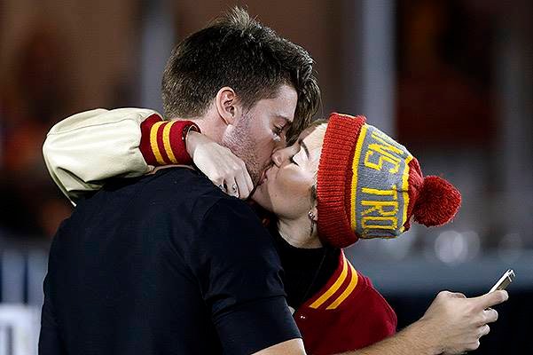 Patrick Schwarzenegger and Miley Cyrus sighting at USC football game