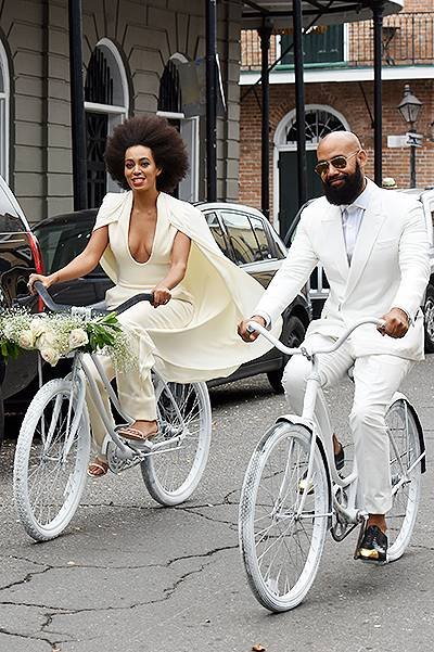 INF - Solange Knowles and her fiance Alan Ferguson ride bicycles all the way to their wedding at the Marigny Opera House in New Orleans