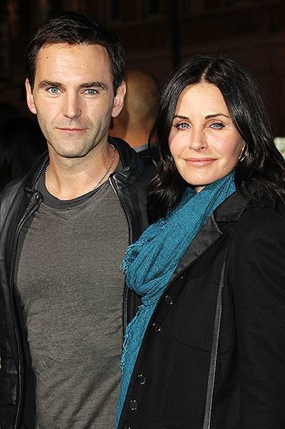 Los Angeles premiere of 'Horrible Bosses 2' at TCL Chinese Theatre - Arrivals Featuring: Courteney Cox, Johnny McDaid Where: Los Angeles, California, United States When: 20 Nov 2014 Credit: FayesVision/WENN.com